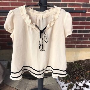 UO pins and needles cream and black blouse